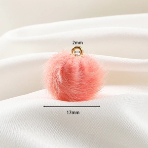 Detail shot of 17mm pink faux mink fur pompom pendant with gold ring for DIY jewelry