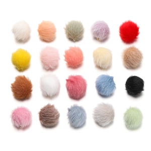 Close-up of 17mm fluffy faux mink pom-poms in a colorful 20-piece assortment for DIY craft