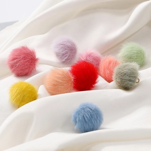 Macro shot of 17mm colorful faux mink fur balls with metal loops for DIY jewelry making