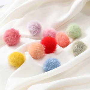 Close-up of 17mm colorful faux mink fur pompom beads with metal loops for DIY jewelry