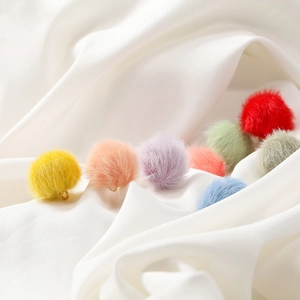 Macro shot of 17mm colorful faux mink fur balls with metal rings for DIY jewelry making