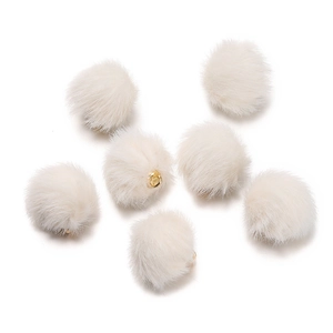 Close-up of seven cream faux mink fur pompom charms with gold metal loops for DIY jewelry