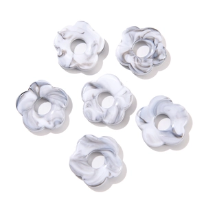 Close-up of 26mm acrylic flower beads with marble texture for DIY jewelry making