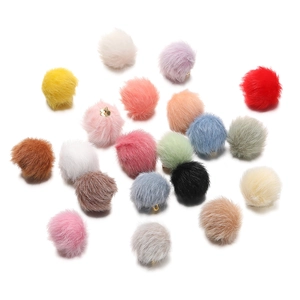 Close-up of colorful 17mm faux mink fur pompom beads with gold loops for DIY jewelry