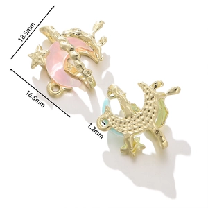Macro view showing dimensions of a star and moon alloy pendant for DIY jewelry