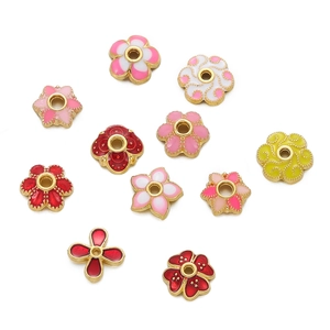 Macro shot of 10mm flower-shaped enamel bead caps for DIY jewelry and bracelet making
