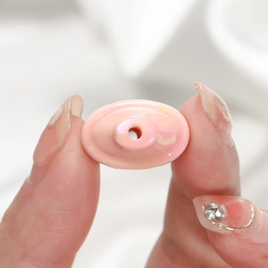 Perline ovali in acrilico rosa con rivestimento UV per gioielli fai da te fatti a mano