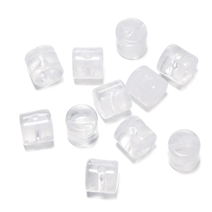 Macro shot of white translucent acrylic cylinder beads for DIY jewelry making