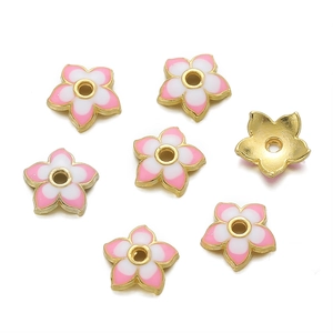 Close-up of pink and white enamel flower spacers with 18K gold finish for DIY jewelry