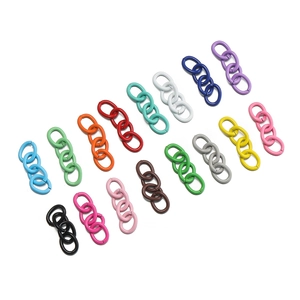 Detailed view of colorful three-link chain connectors for DIY jewelry making accessories