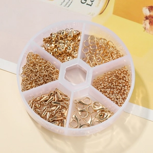 Kit de accesorios dorados para joyería DIY con cierres de langosta y anillas en caja de 6 rejillas