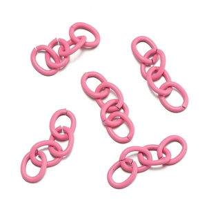 Detail view of pink four-link chain connectors for DIY jewelry and keychain making
