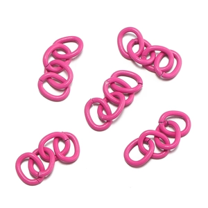 Close-up of hot pink lacquered oval link chains for DIY jewelry and keychains