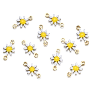 Detailed view of ten colorful enamel daisy flower pendants for DIY jewelry crafting
