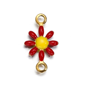 Close-up of a double-loop daisy charm with red enamel petals and gold finish for DIY jewelry