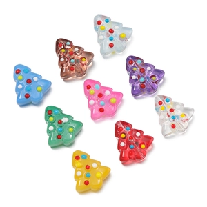 Close-up of colorful Christmas tree beads with polka dots for DIY jewelry making