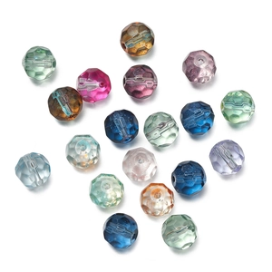 Macro view of 10mm faceted glass crystal beads with iridescent gradient finish