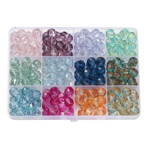 Detailed top view of 12-grid organizer box with multi-colored faceted glass beads