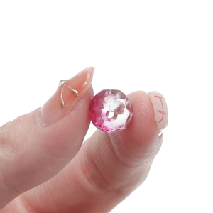Detailed close-up of 10mm gradient mermaid crystal wheel bead for DIY jewelry making