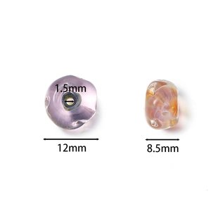 Dettaglio di perle in vetro da 12mm con foro da 1,5mm e larghezza di 8,5mm
