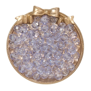 Macro detail of faceted 10mm gradient mermaid glass beads in a golden tray for DIY jewelry