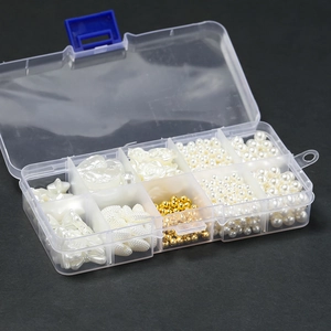 Detail of 10-compartment storage box with white faux pearls and DIY craft bead kit