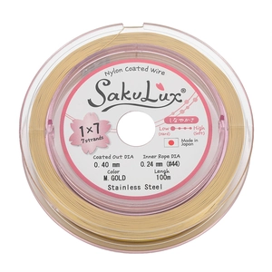 Macro-opname van 0,40 mm goud nylon gecoat roestvrij staaldraad voor DIY kralen