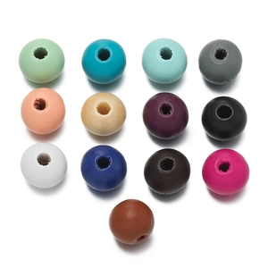 Grille détaillée de perles rondes en bois colorées avec trou central pour loisirs créatifs