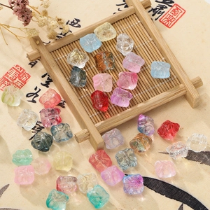 Detailed view of colorful translucent 11.5mm glass lion beads for DIY jewelry making