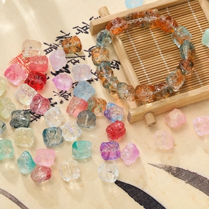 Detailed macro view of 11.5mm glazed lion dance beads for DIY jewelry making