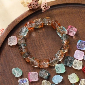 Detailed close-up of 11.5mm glazed lion dance beads for DIY jewelry making and bracelets
