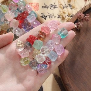 Macro shot of colorful translucent glazed lion beads for DIY handmade jewelry crafting