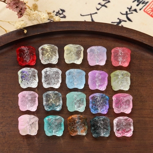 Detailed collection of 11.5mm lion-shaped glass beads in 20 colors for DIY jewelry making