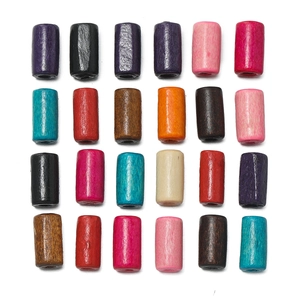 Flat lay of colorful cylindrical wooden tube beads with natural texture for DIY jewelry