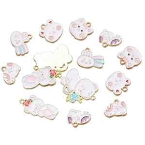 Macro shot of colorful enamel alloy animal pendants for DIY jewelry and keychain decor