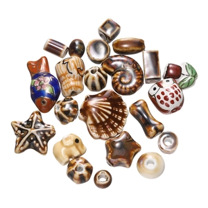 Assorted ceramic beads with animal shapes for DIY jewelry making and handmade crafts