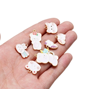 DIY colorful cartoon alloy enamel pendants with cat rabbit and bear charms on a hand