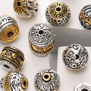 Tibetan-style silver and gold barrel beads with auspicious cloud patterns for DIY jewelry