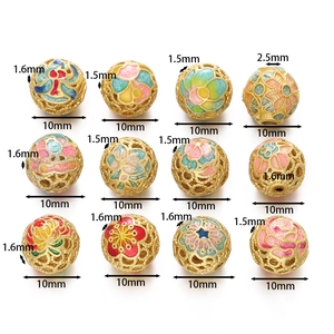 Close-up of 10mm gold cloisonné enamel flower beads with various hole sizes for DIY crafts