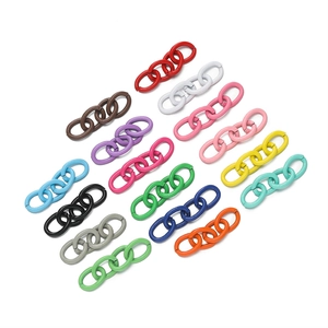 Close-up of colorful painted metal link chains for DIY jewelry making and keychains