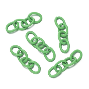 Close-up of bright green painted four-link chains for DIY keychains and accessory making