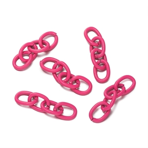 Detail view of five pink matte painted 4-link metal chains for DIY jewelry making