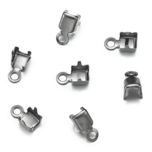 Close-up of gunmetal grey metal crimp ends with lobster claws for DIY jewelry making