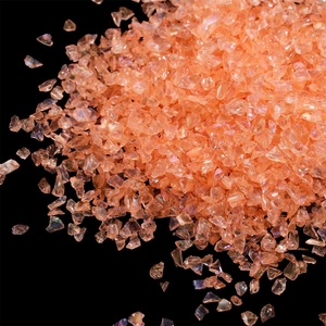 Iridescent apricot glass sands for DIY crafts and nail art with rainbow crystal finish