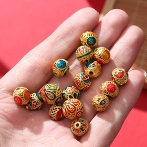 Golden cloisonne hollow beads with auspicious characters and colorful enamel coating