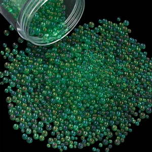 Macro shot of 28g aurora green glass bubble beads for DIY nail art and resin filler