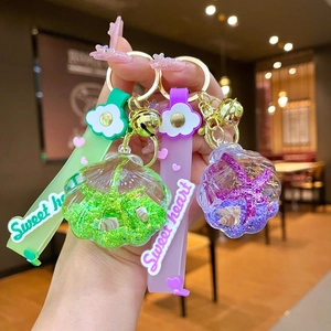 Cute shell liquid glitter keychain with tiny starfish and sweet heart silicone strap