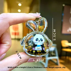 Detail showing dimensions of panda liquid glitter charm, 4.8cm wide by 5.5cm high