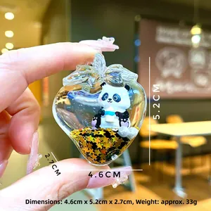 Detail of panda charm acrylic pendant with golden stars, 4.6cm wide and 5.2cm high