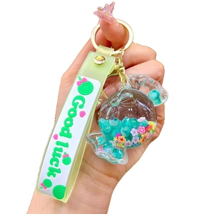 Luminous candy liquid sand bottle keychain with Good Luck strap and colorful beads